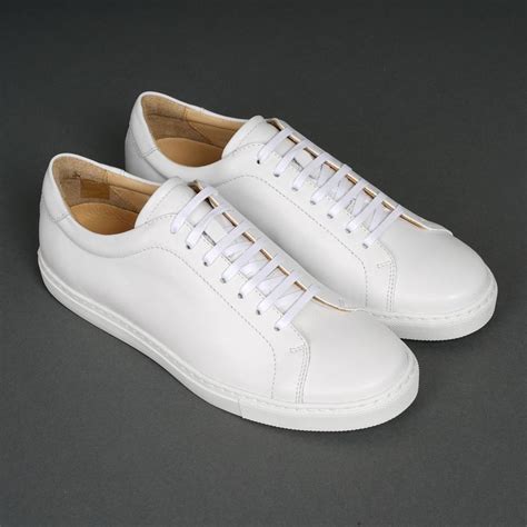 solid white leather shoes.